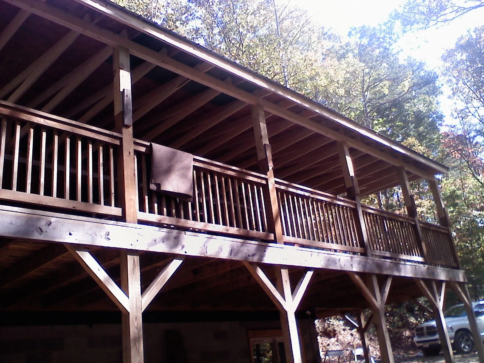 Timber framing under a new elevated porch and deck — Roof Leak Repair in Homeland by Roofing Brothers